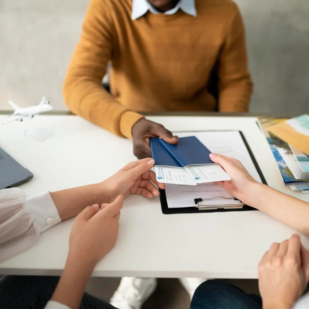 hands-holding-tickets-close-up